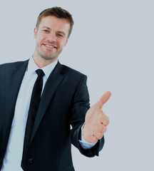 Business man saying welcome and giving hand.