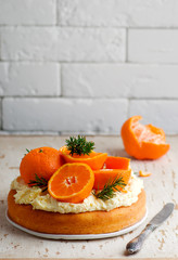 fresh tangerine cake with cream cheese frosting.