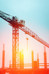 building crane against the background of construction