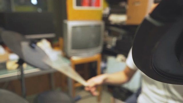 Drummer jamming fastly on his electric drums.