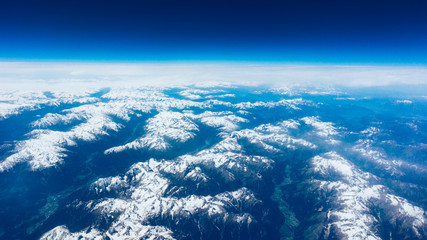 Fototapeta na wymiar Landscape of Mountain. view from the airplane window