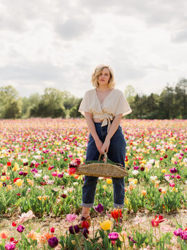 Woman in a Field of Tulips