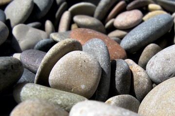 Stones of a pebble beach closeup 