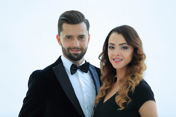 Portrait of a handsome man looking at the camera with a woman