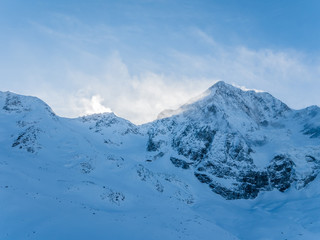 Fototapeta na wymiar Winter landscape of Alpine mountain range. Gran Zebru peak, Solda, South Tyrol, Italy