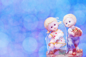 Couple of Dolls boy and Girls with bokeh background