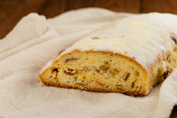 Traditional German christmas stollen fruit cake or homemade sweet bread