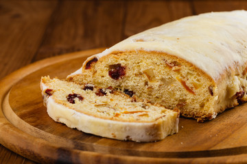 Traditional German christmas stollen fruit cake or homemade sweet bread