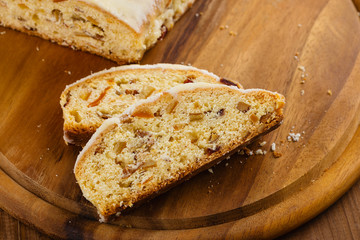 Traditional German christmas stollen fruit cake or homemade sweet bread