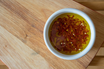 white bowl of chilli oil