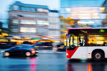 bus in city traffic in motion blur - obrazy, fototapety, plakaty