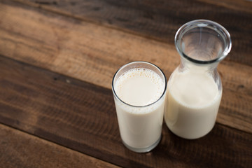 milk in a bottle and glass. healthy lifestyle concept