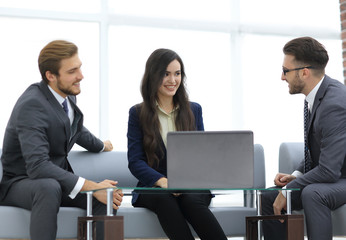 Confident business team working in an office.