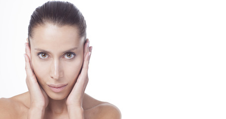 Fototapeta premium Face of a beautiful young woman with healthy skin.