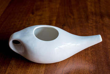 neti pot, ayurvedic tools for cleaning nose with water and salt