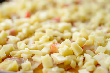 Fresh cheese crumbles over pasta