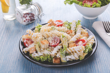 caesar salad pasta avocado chicken fillet tomato sauce close up