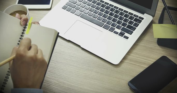 Young Business Man Working Hard, at the Office Table, Time Lapse Footage Concept of hard work