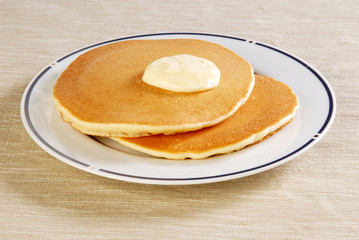 Pile fresh pancake with butter