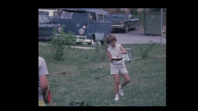 1970 Young boy and girl play Tambourelli badminton