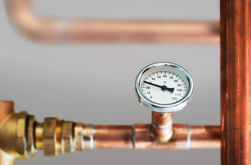 Heating system's cooper pipes  with Thermometer