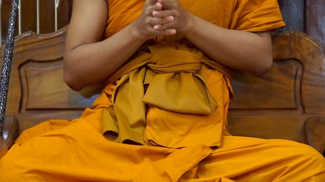 Thai monks are praying