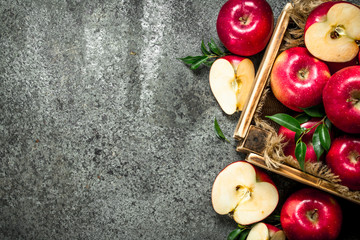 box with ripe red apples.