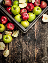 box with fresh red and green apples.