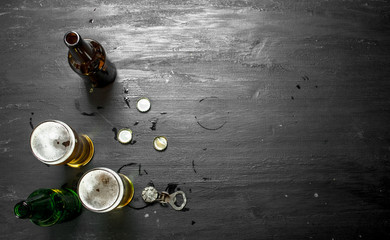 Glasses with beer, stoppers and opener.