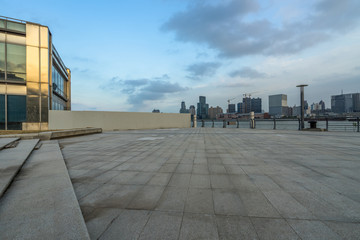 Panoramic skyline and buildings with empty square floor in shanghai