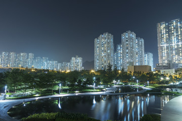 Fototapeta na wymiar High rise residential building and public park in Hong Kong city