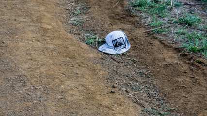a hat in the dirt