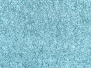 Texture of light blue wallpaper with a pattern