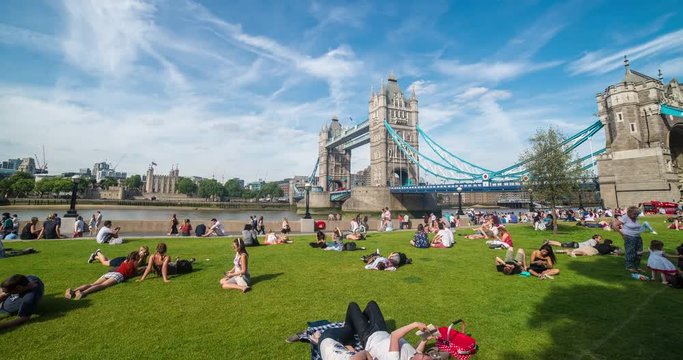 London,England,UK – July 2015 : Moving timelapse / hyperlapse of Tower Bridge with people in the foreground