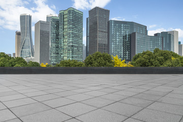 Panoramic skyline and buildings with empty square floor.