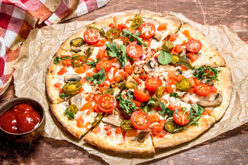 Mexican pizza with hot pepper.