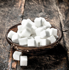 Cubes of sugar in a bowl.