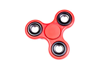 Red fidget spinner isolated on white