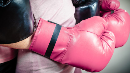 Woman wearing boxing gloves