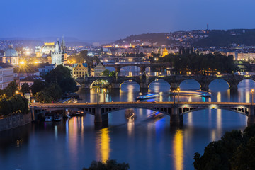 Fototapeta na wymiar Vltava River and Prague cityscape at sunset. Czech Republic..