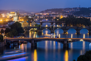 Vltava River and Prague cityscape at sunset. Czech Republic..