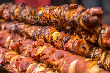 Fresh meat shish kebab prepared on a grill.