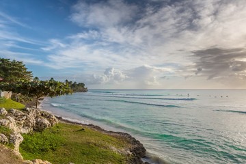 Beautiful Tropical Coast with Clear Water and Cloudy Sky