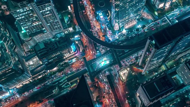 Time lapse,Hyperlapse ,Of traffic on city streets at night. Aerial view and top view of traffic on freeway, 4K.