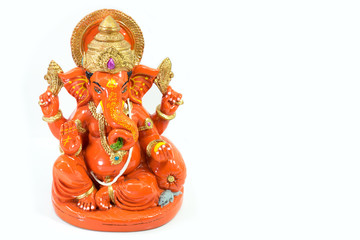 Orange resin Ganesh Elephant god in Hindu isolated on white background.