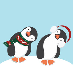 Fototapeta premium Cute Penguins in scarf and ear muffs