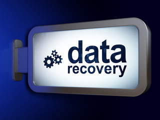 Data concept: Data Recovery and Gears on advertising billboard background, 3D rendering