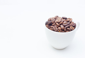 roasted coffee beans on white background space modern style.