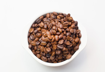 roasted coffee beans on white background space modern style.