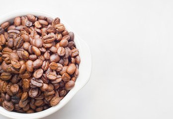 roasted coffee beans on white background space modern style.